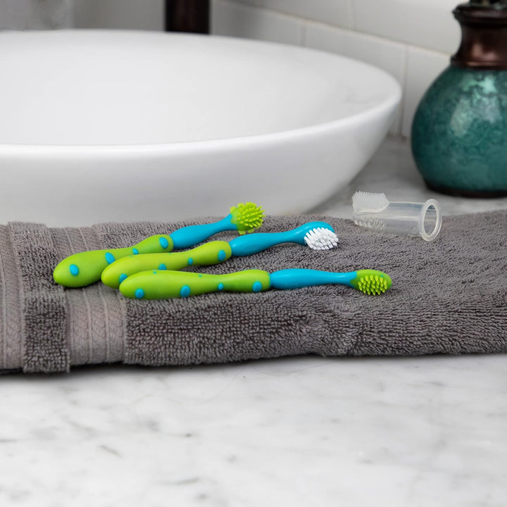 Oral Care Set with Stand; 4-Stage System with 1 Silicone Finger Massager, 2 Massaging Brushes, 1 Soft Nylon Bristle Toddler Toothbrush; 0+ Months, Blue & Aqua