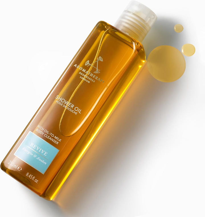 Revive Shower Oil 250 Ml, Energise & Awaken with Our Reviving, Therapeutic Essential Oil Blend of Grapefruit, Rosemary & Juniper Berry. Luxurious Oil-To-Milk Formula